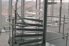 Spindeltreppe aus Edelstahl mit Glastufen Vorstandsbereich der Nord/LB in Hannover